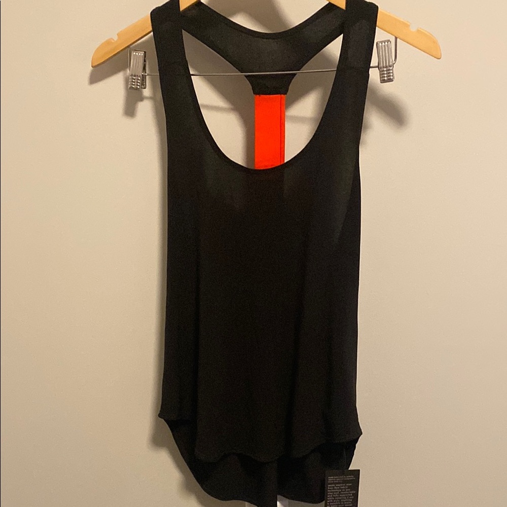 Onzie one size fits all Baggy Elastic Tank top 
Black and coral.